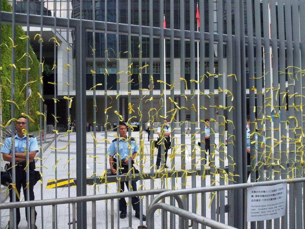 Yellow ribbons adorn Civic Square fence after protestors ejected by Hong Kong Police in September 2014