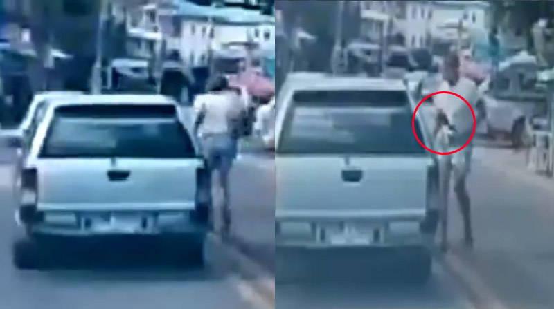 A dashcam video shows Gerard Collins, 72,  retrieving what appears to be a machete from the back of his car before running over to confront Sumet Roongrattanapan, 28, after their cars collided. Screenshot: Pattaya Eastern News