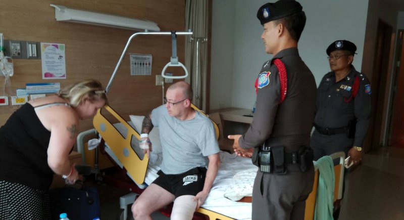 Police question the couple at the hospital before it became apparent that they had lied. Photos: The Phuket News