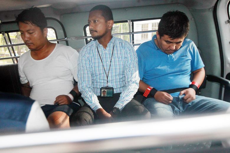 Myanmar national Phyo Min Naing (left) and Singapore permanent resident Zaw Min Hlaing (right) were recruited by a Myanmar businessman to abduct his wife’s alleged lover with a view to getting him killed. Photo: Shin Min Daily News