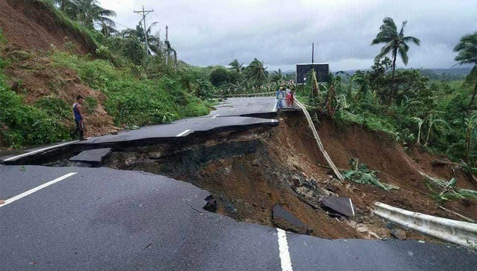A portion of a road in Pinabacdao town, Samar has collapsed due to rains brought by tropical storm “Urduja.” Photo Courtesy of Al Pores via ABSCBN News