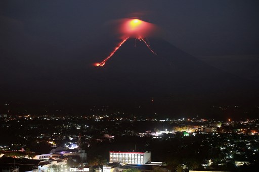 Lava from Mayon volcano is seen as it erupts in Legazpi on January 15, 2018. Photo by AFP