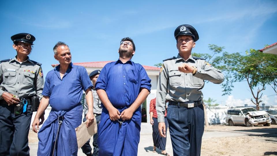 Aung Naing Soe and co-defendant Hla Tin are escorted by police outside Yamethin Prison. Photo: Aung Khant (Ye Htoo)