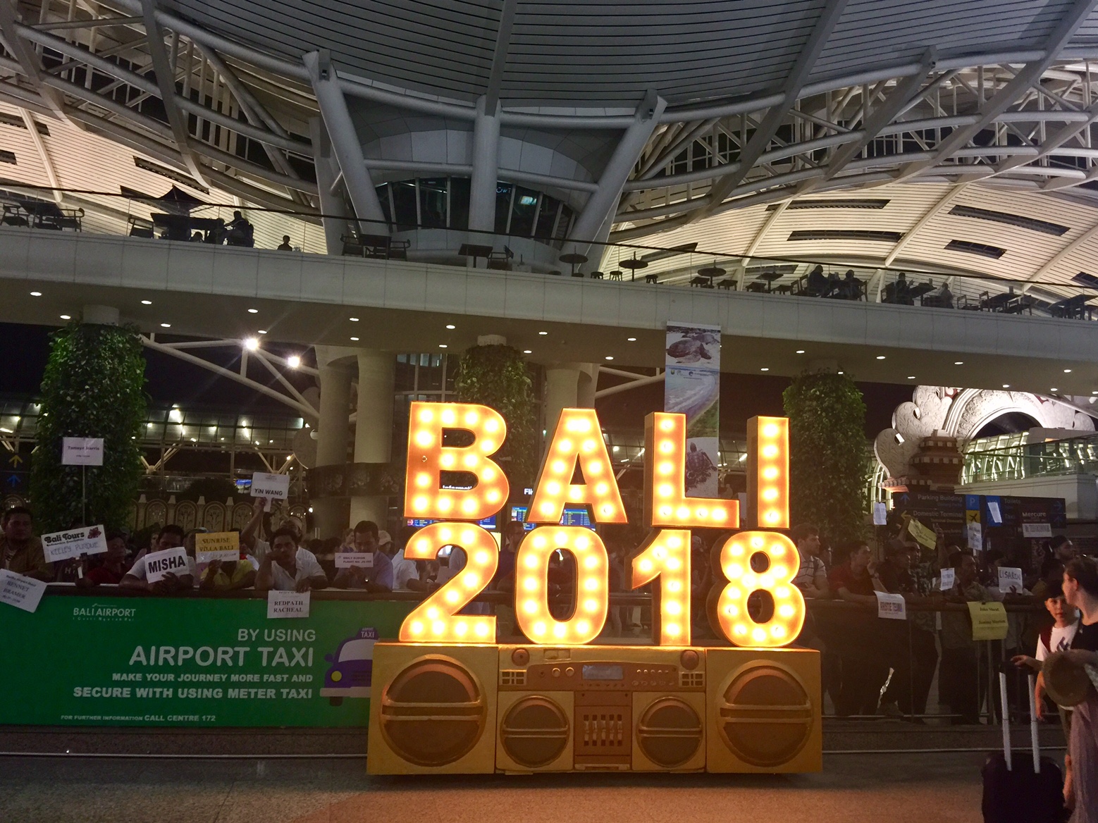 A sign set up to greet travelers at Ngurah Rai Airport’s international arrivals hall. Photo: Coconuts Bali