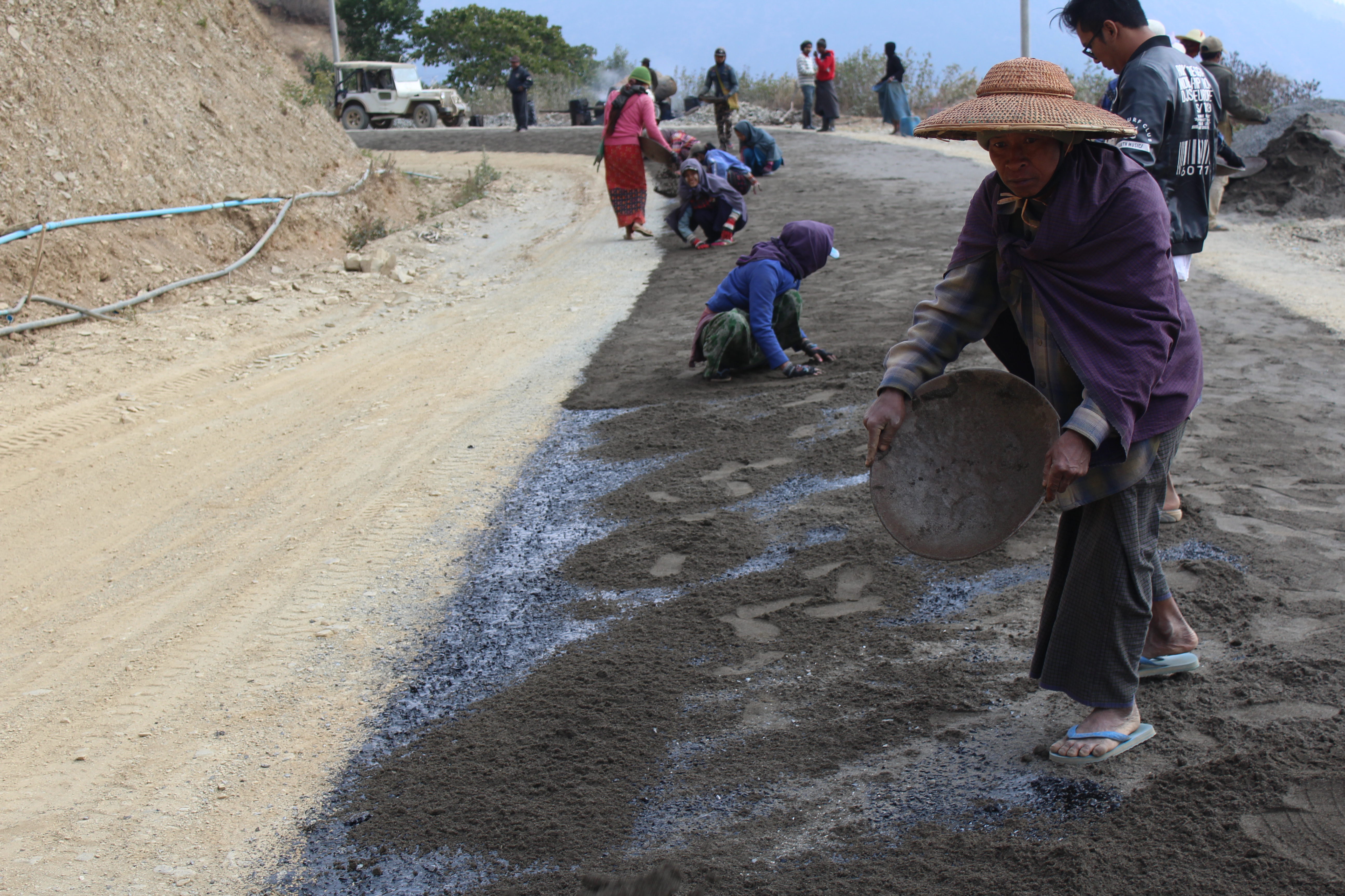 Road workers in Chin State. Photo: Jacob Goldberg