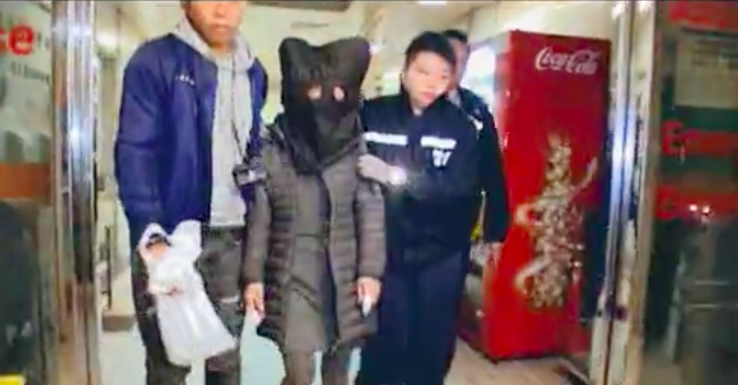 A 41-year-old woman surnamed Wong was arrested for reportedly attacking a woman with a fruit knife and yelling “what are you doing seducing my husband?”. Screengrab via Apple Daily video.