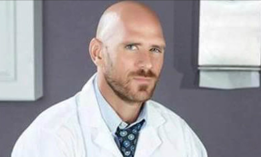 American porn star Johnny Sins role playing as a doctor.