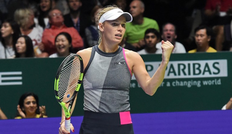 Caroline Wozniacki of Denmark reacts to a point against Venus Williams of the US during the WTA Finals single tennis tournament in Singapore on October 29, 2017. Photo: Roslan Rahman/AFP