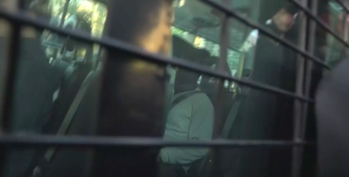 KMB bus driver Chan Ho-ming arrives at Fanling Magistrates’ Court charged with dangerous driving causing death following the fatal accident in Tai Po on Saturday that killed 19 people. Screengrab via Facebook video.