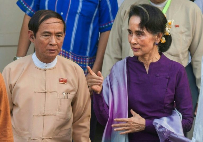 Win Myint with Aung San Suu Kyi. AFP file photo