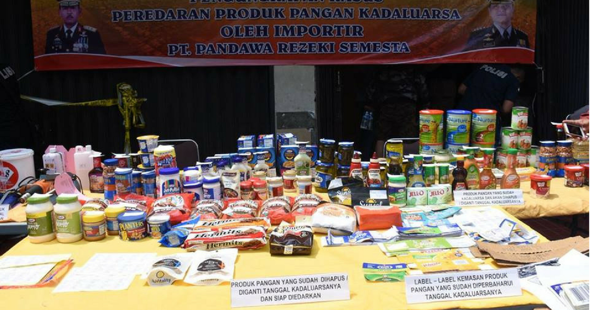 West Jakarta Police press conference on Tuesday March 21, 2018, showing products that had been affixed with altered labels featuring doctored expiration dates. Photo: Divisi Humas Polri