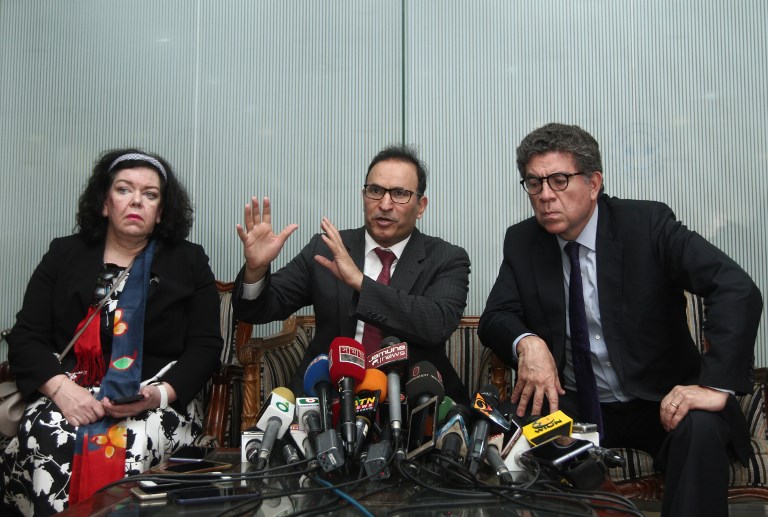 United Nations Security Council member Mansour Ayyad Al Otaibi (C) talks as delegation members Karen Piece (L) and Gustavo Adolfo Meza Cuadra Velasquez look on during a press conference at the Hazrat Shah Jalal International Airport in the Bangladeshi capital Dhaka on April 30, 2018. / AFP PHOTO / RAJIB DHAR