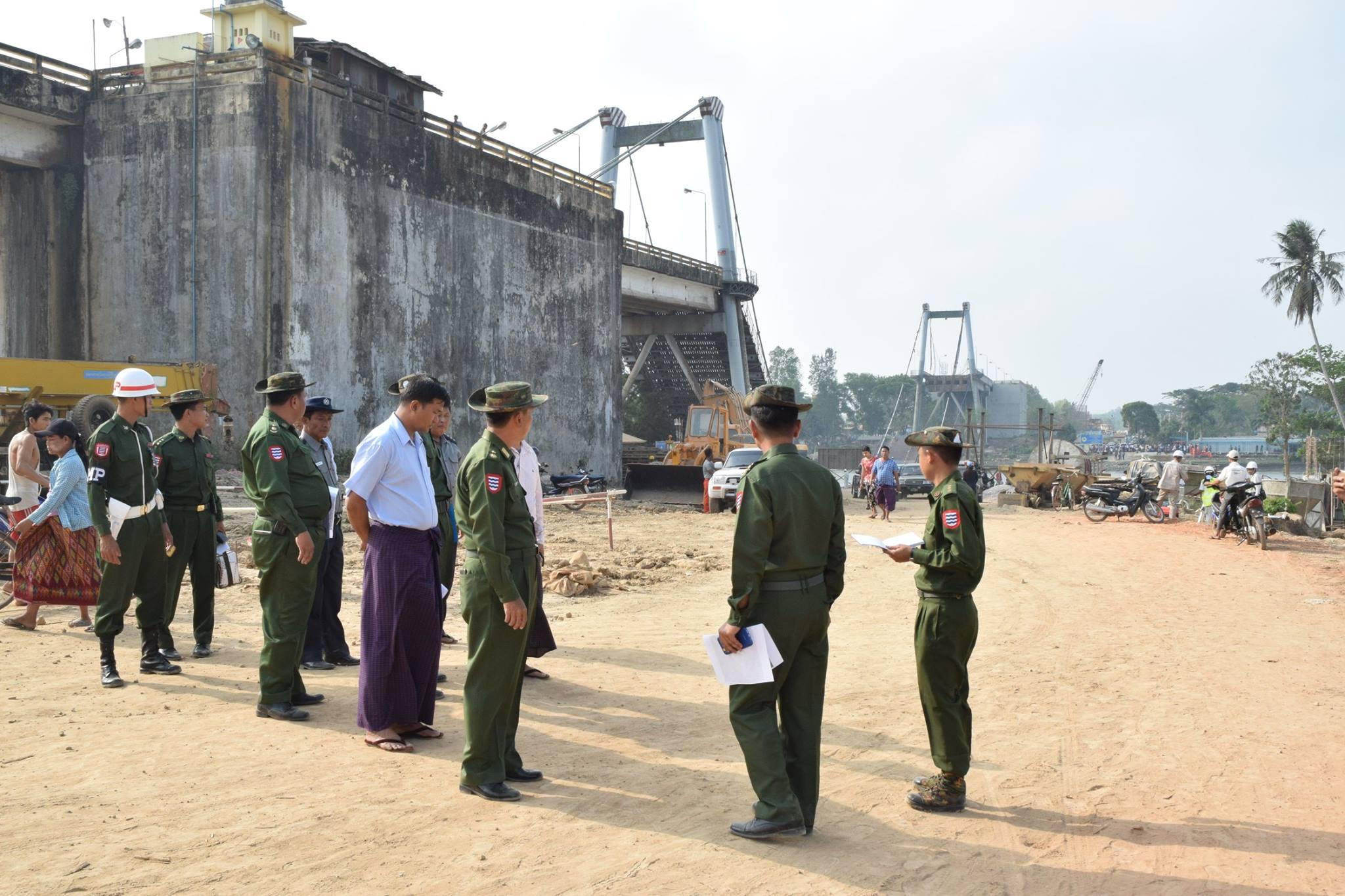 Myanmar military officers inspect a bridge that collapsed in Myaungmya, Ayeyawady Region, on April 1, 2018., killing at least one person. Photo: Office of the Commander-in-Chief
