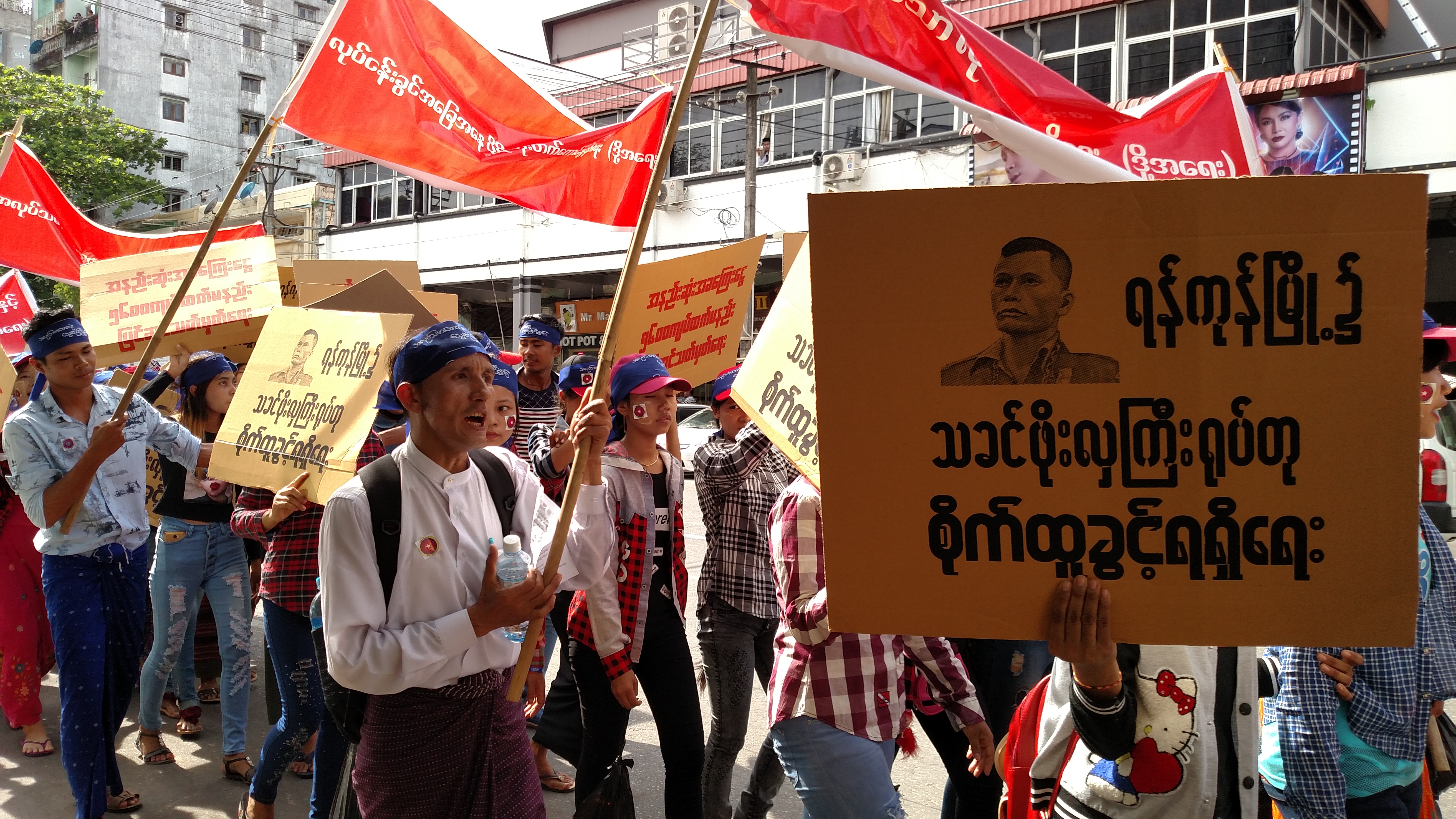 Labor activists demonstrate in downtown Yangon on May 1, 2018.