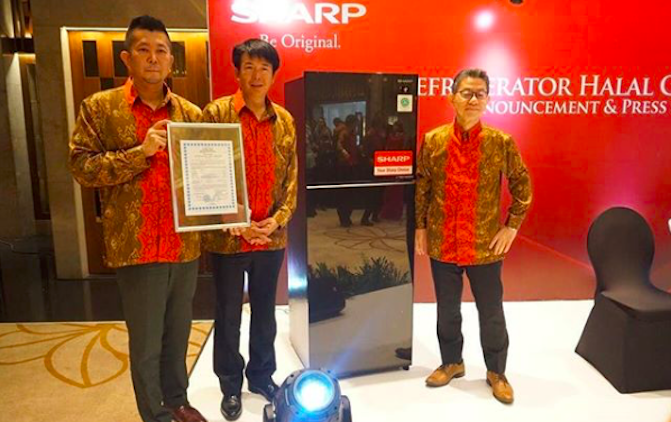 Sharp Indonesia executives posing with the company’s new halal fridge during the product’s unveiling on May 3, 2018. Photo: Instagram/@sharpindonesia