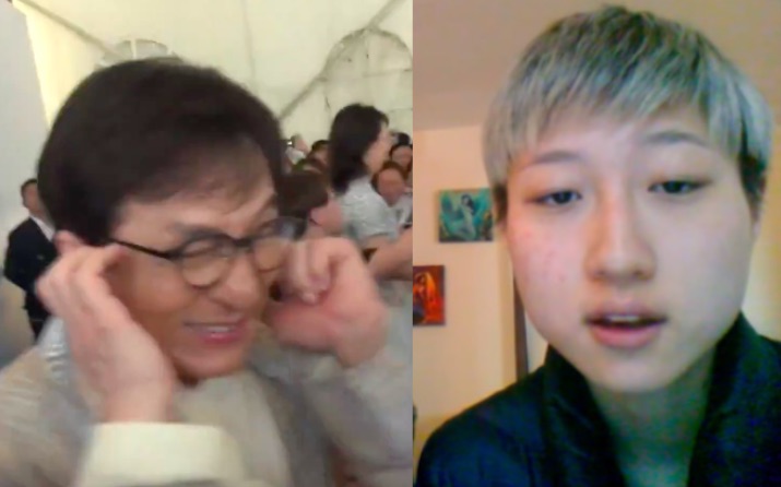 Jackie Chan grimaces, covers ears, and stays silent when ...