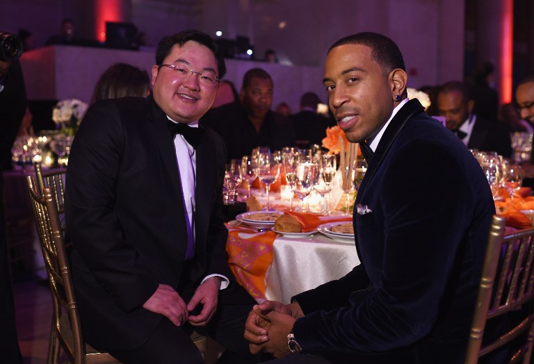 NEW YORK, NY – OCTOBER 20: Mr. Jho Low and Ludacris attend Angel Ball 2014 hosted by Gabrielle’s Angel Foundation at Cipriani Wall Street on October 20, 2014 in New York City.   Dimitrios Kambouris/Getty Images for Gabrielle’s Angel Foundation/AFP