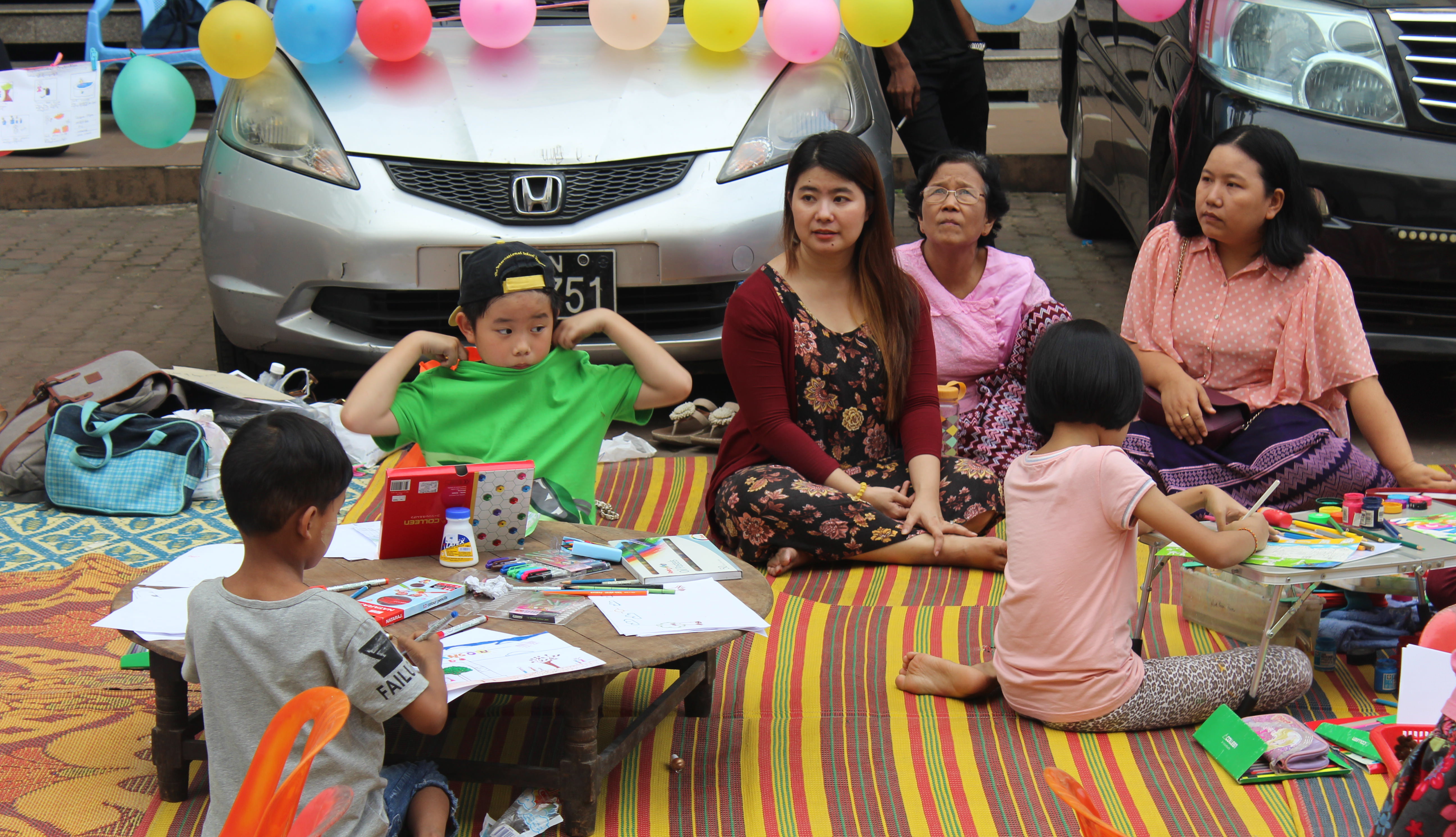 Yangon residents attend a street festival on Dec. 8, 2017. Photo: Jacob Goldberg