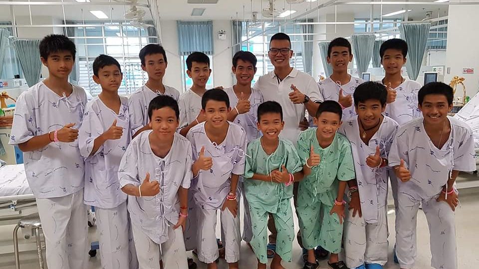 The 13 young men  rescued last week from the flooded Luang Cave is pictured with Dr. Phak Lohanchun (third from top right), who was among the first rescuers to reach them. Photo: Dr. Phak Lohanchun/ Facebook