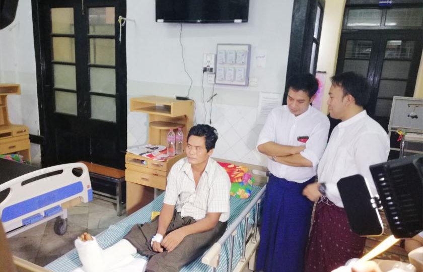 The patient recovers after his leg reattachment surgery. Photo: Yangon General Hospital