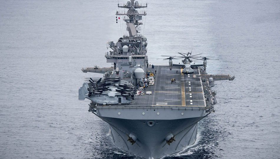 Wasp-class amphibious assault ship USS Essex (LHD 2) transits the Pacific Ocean during an amphibious squadron and Marine expeditionary unit (MEU) integration (PMINT) exercise in April 2018. Sabyn L. Marrs, U.S. Navy handout photo
