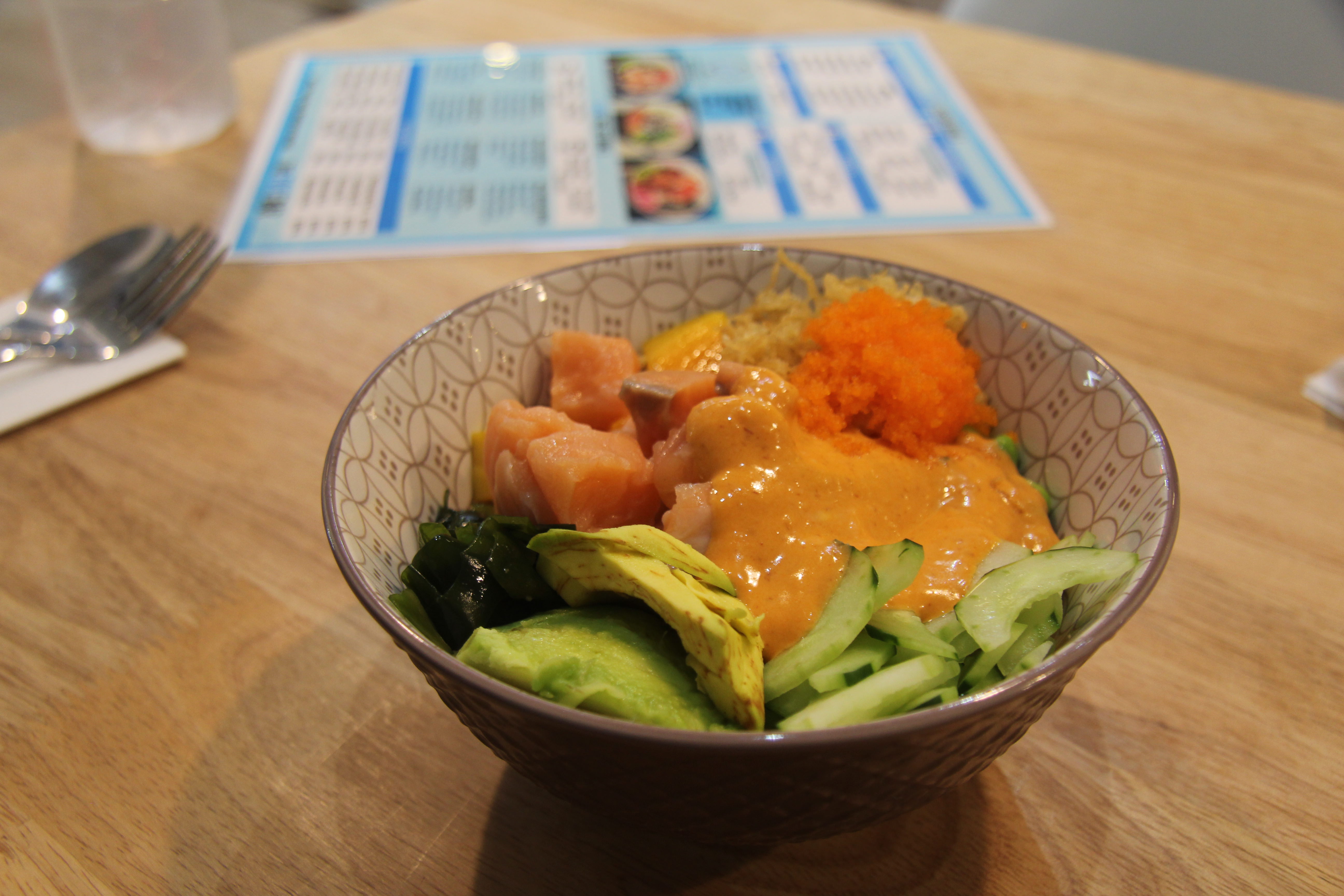 A salmon poke bowl with spicy aioli from the Poke Bar in Yangon. Photo: Coconuts Yangon