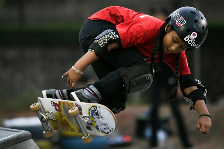 The mother of Indonesia’s nine-year-old skateboarder Aliqqa Noverry admits to being scared witless as she sits and watches her daughter skating with boys almost twice her size. AFP / Mohd RASFAN