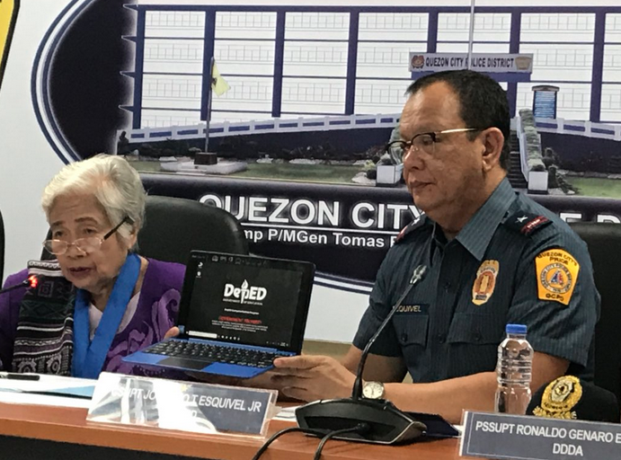 Department of Education Secretary Leonor Briones and Quezon City Police District Chief Joyet Esquivel. Photo: Doland Castro/ABS-CBN News.