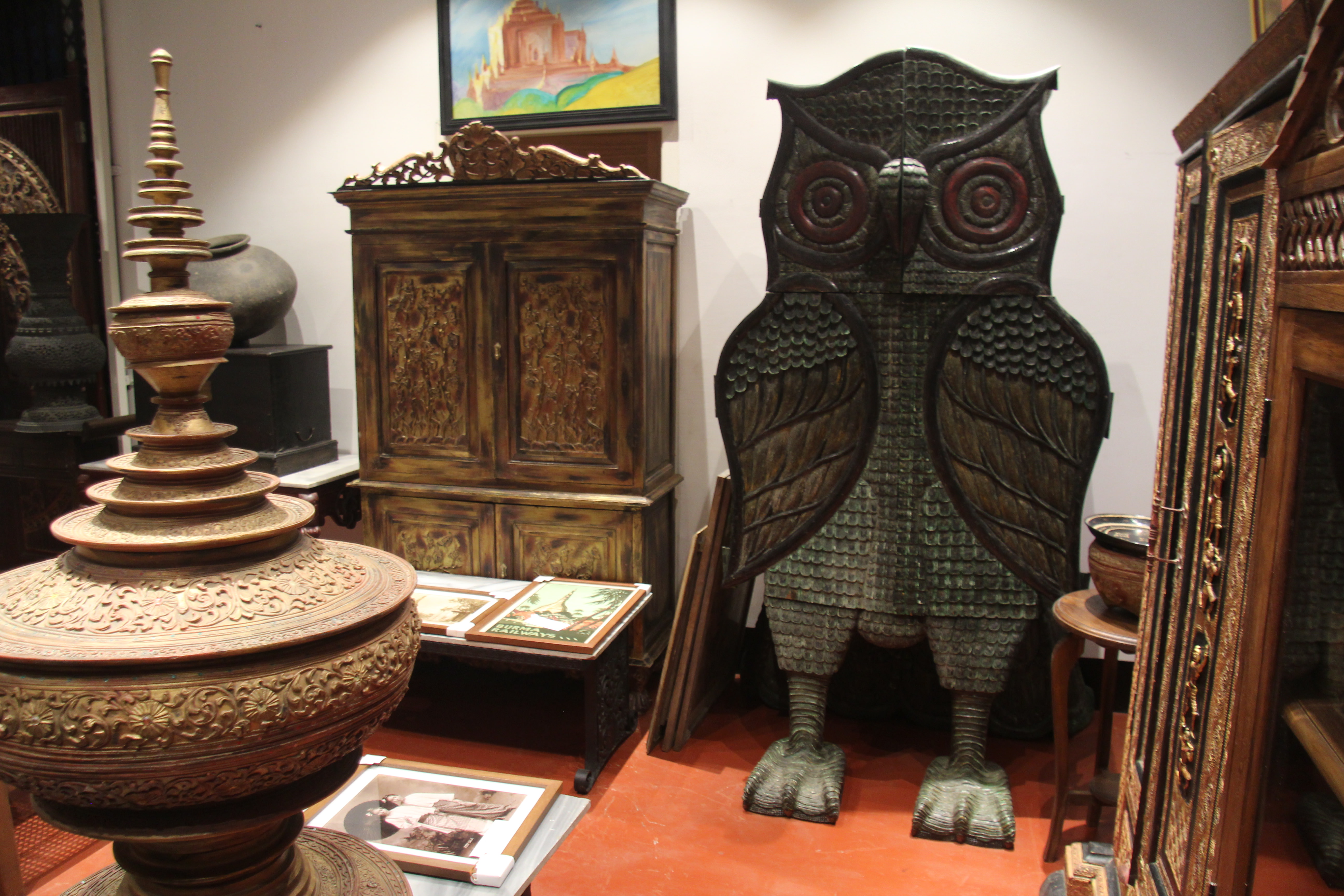 A giant hand-carved, owl-shaped cupboard found at an estate sale in Mawlamyine.