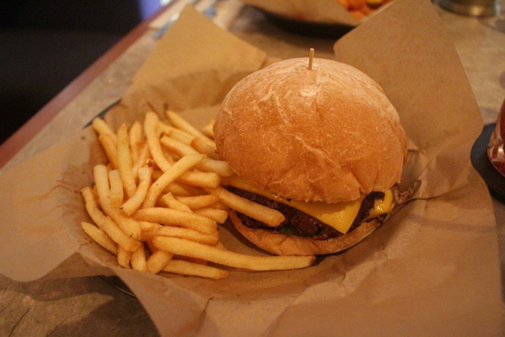 Double patty burger and fries by Bitters and Sweets. Photo by Vicky Wong.