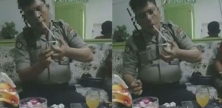 Screenshots of a viral video showing a Medan Police officer, identified at Aipta TP, smoking meth. 