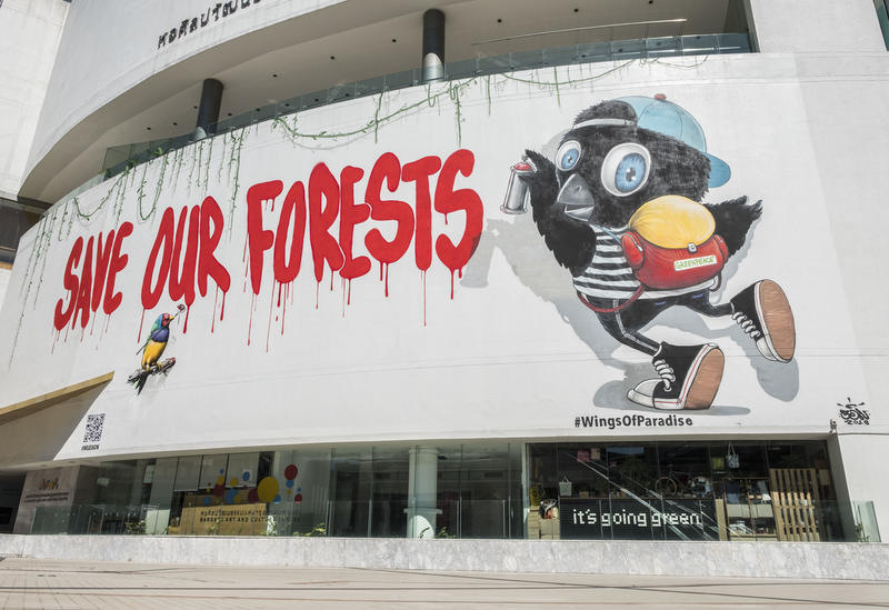 'Wings Of Paradise' artwork by street artist Muebon on the facade of the Bangkok Art and Culture Centre (BACC). Photo: Greenpeace