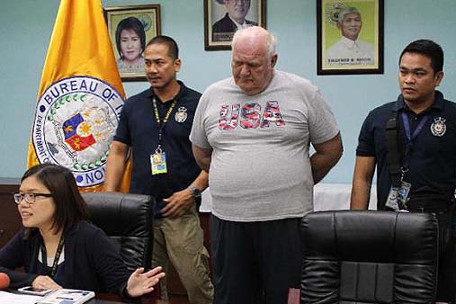 The Bureau of Immigration presented Douglas Slade to the media shortly before he was extradited to the United Kingdom. Photo: Gilbert Sy /Bureau of Immigration via Associated Press/ABS-CBN News