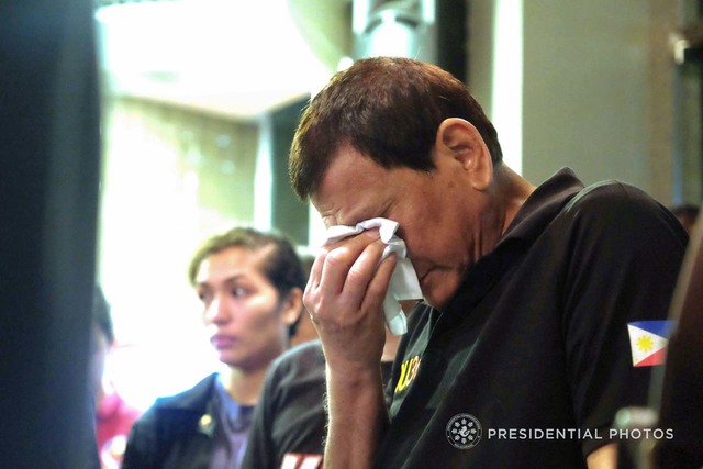 President Rodrigo Duterte bursts in tears upon news that the people inside the burning NCCC Mall in Davao City on December 2017 have no chance of survival. PHOTO: Malacañang Handout