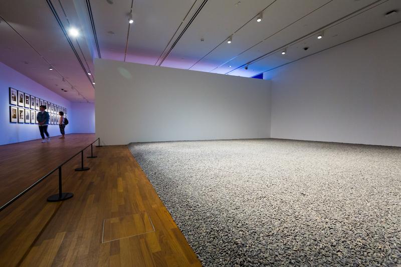 Ai Weiwei, 'Sunflower Seeds', 2010. Each seed is handcrafted by ceramic artisans in Jingdezhen, China, challenging the 'Made in China' stereotype of cheap mass production. Photo: National Gallery Singapore 