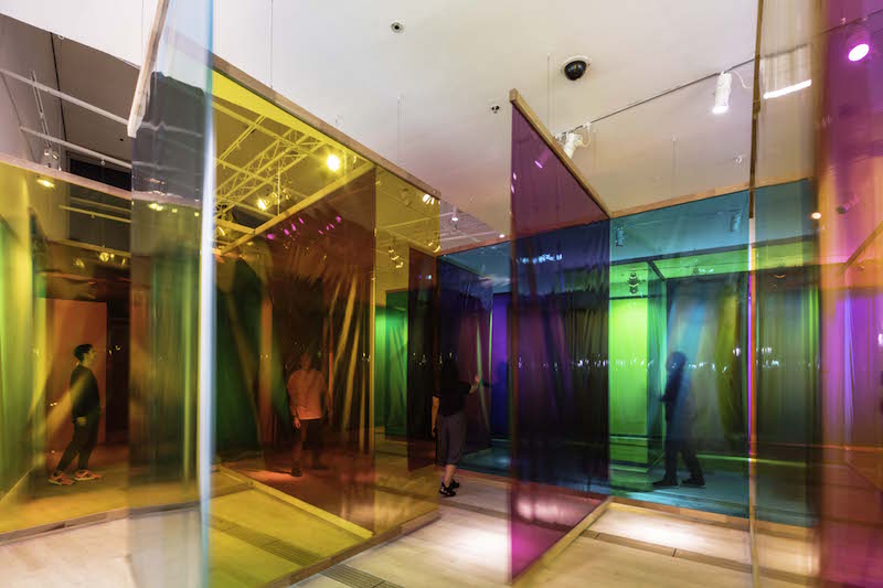 Olafur Eliasson, 'Seu corpo da obra (Your Body of Work)', 2011. The translucent colored sheets beckon visitors to stroll around the spaces and experience different layers of color. Photo: Marina Bay Sands