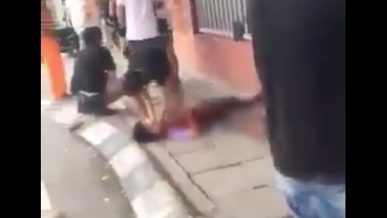 A bystander tries to assist the victim
