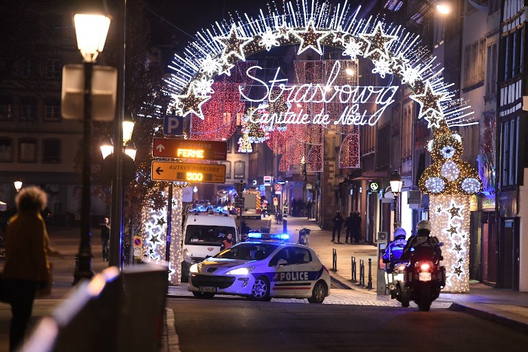 A police car drives in the streets of Strasbourg, eastern France, after a shooting breakout, on December 11, 2018. Photo: AFP