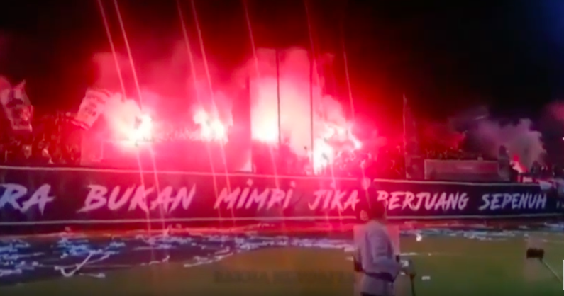 Rowdy fans set off flares at Bali United league match on Sunday, December 2, 2018. Photo via Youtube/ Rakha Nurdaffa
