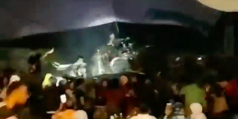 Dramatic video shows the tsunami crashing into a performance by pop band Seventeen, hurling band members offstage (Photo: Facebook screengrab)