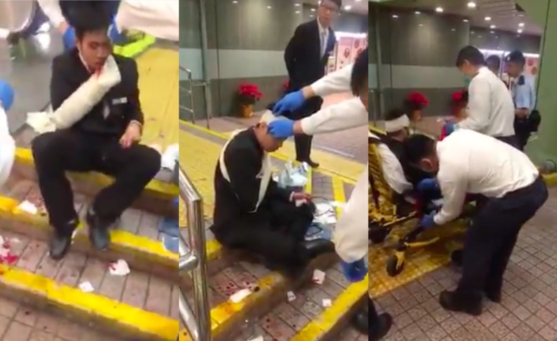 A security guard in Tai Po receiving medical attention after getting attacked by a man wielding a pair of scissors. Screengrab via Facebook video.