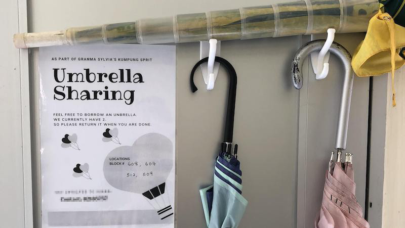 An umbrella-sharing initiative among a small bunch of Pasir Ris flats has gotten love and doubts by netizens (Photo: u/digimervyn / Reddit)