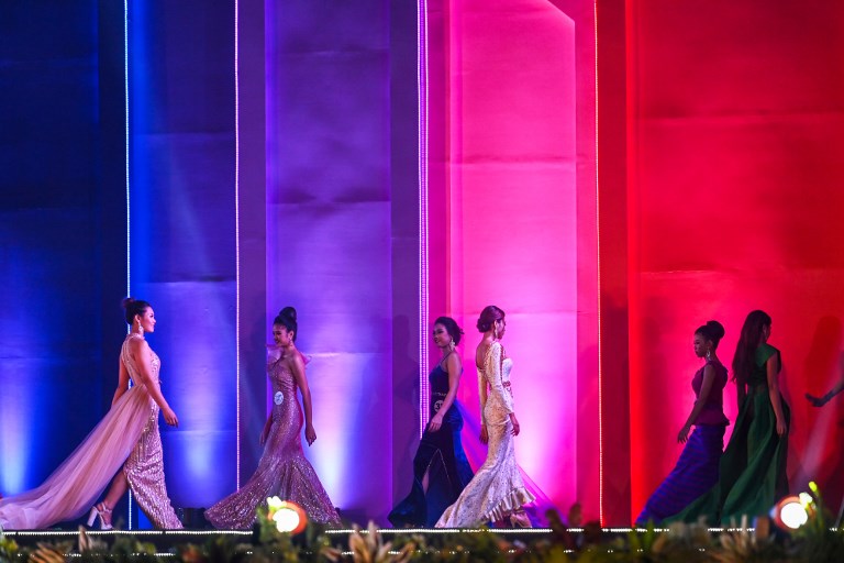 Candidates walk on stage as they participate in the Miss Ethnic Myanmar 2019 contest during the Myanmar Ethnics Culture festival in Yangon on January 29, 2019. – This event is being held between January 25 and 30. (Photo by YE AUNG THU / AFP)