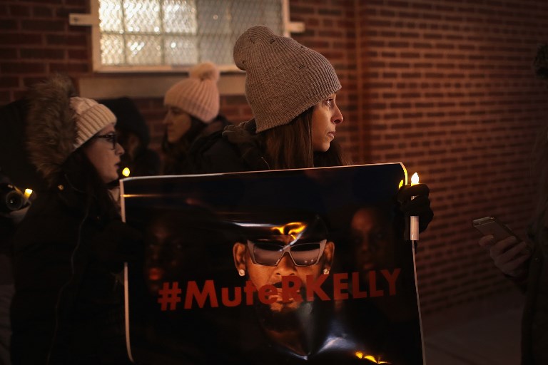 CHICAGO, ILLINOIS – JANUARY 09: Demonstrators gather near the studio of singer R. Kelly to call for a boycott of his music after allegations of sexual abuse against young girls were raised on the highly-rated Lifetime mini-series “Surviving R. Kelly” on January 09, 2019 in Chicago, Illinois. Prosecutors in Illinois and Georgia have opened investigations into allegations made against the singer, whose real name is Robert Sylvester Kelly.   Scott Olson/Getty Images/AFP