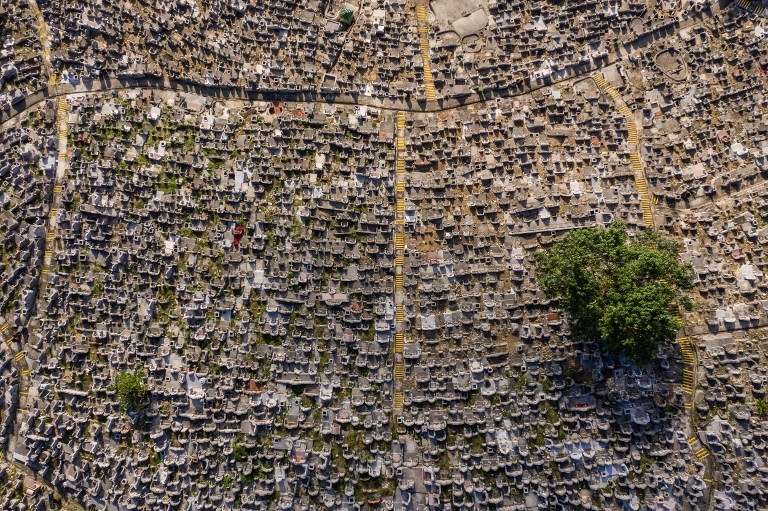 An aerial photo taken last year of a cemetery in Hong Kong. Photo via Dale De La Rey / AFP