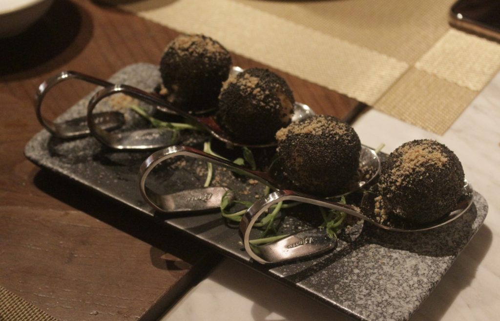 SHÉ's stuffed truffle balls with minced meat and mushrooms. Photo by Vicky Wong.