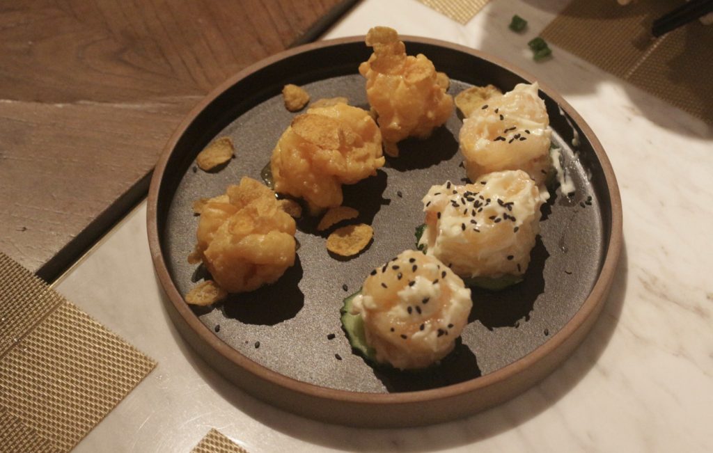 SHÉ's Yin Yang style salted egg yolk and horseradish prawns. Photo by Vicky Wong.