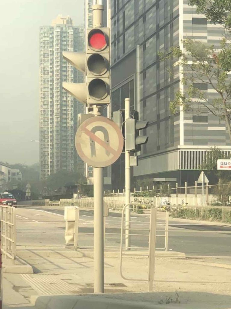 A dust-covered road sign in Tseung Kwan O. Photo via Facebook/Harvey Kat.