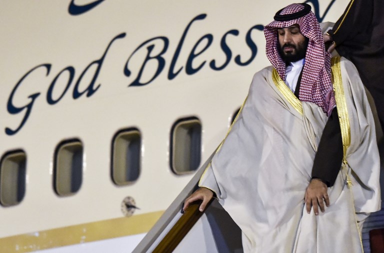 Saudi Crown Prince Mohammed bin Salman descends from his plane as he arrives at Algiers International Airport, southeast of the capital Algiers on December 2, 2018. (Photo by RYAD KRAMDI / AFP)