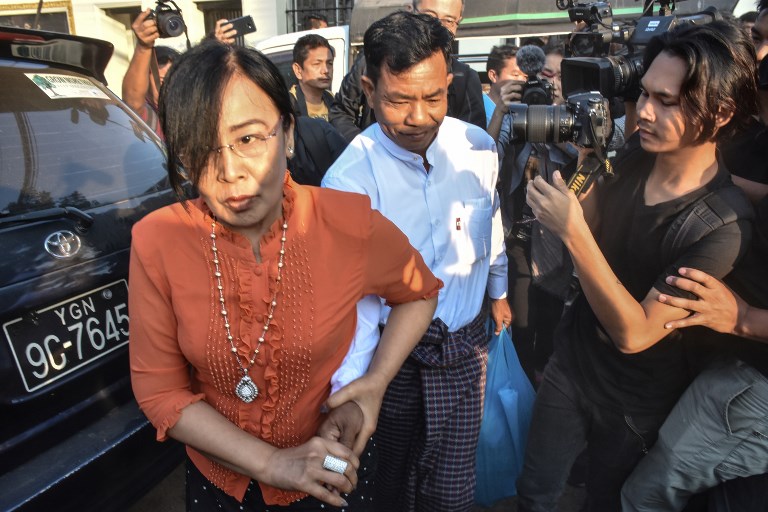 Former Myanmar police officer Moe Yan Naing (C) leaves the Insein prison after serving his one year sentence in Yangon on February 1, 2019. – Lawyers for two Reuters journalists jailed for seven years in Myanmar on charges linked to their reporting of the Rohingya crisis are set on February 1 to lodge an appeal with the Supreme Court – a last chance of a reprieve through the legal system. Reporters Wa Lone, 32, and Kyaw Soe Oo, 28, both Myanmar nationals, were arrested in Yangon in December 2017 and later jailed for violating the Official Secrets Act. (Photo by – / AFP)